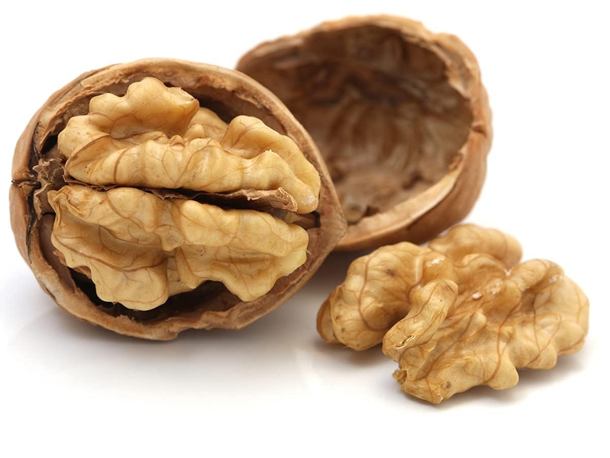 https://www.crunchynut.shop/uploads/Walnuts Without Shell Broken Light Half Color